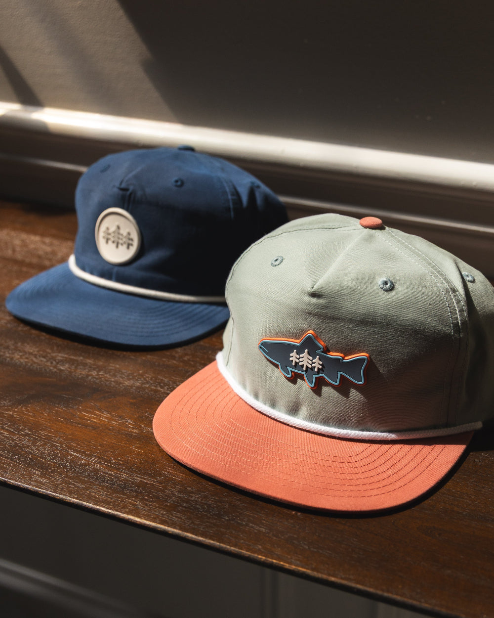 A couple of different flatbill hats