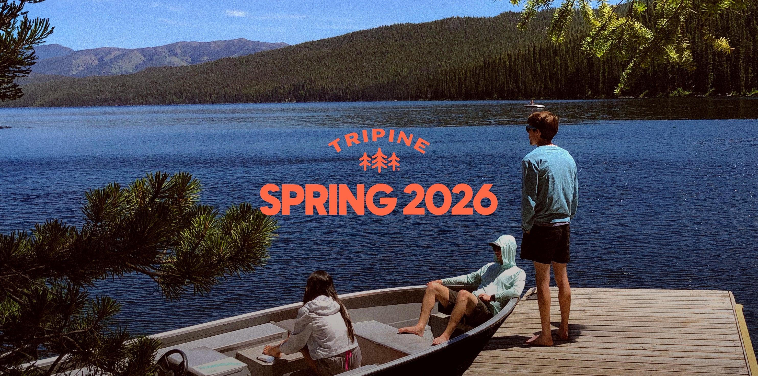 Three people on a dock overlooking a lake with 'Tripine Spring 2026' text overlay.