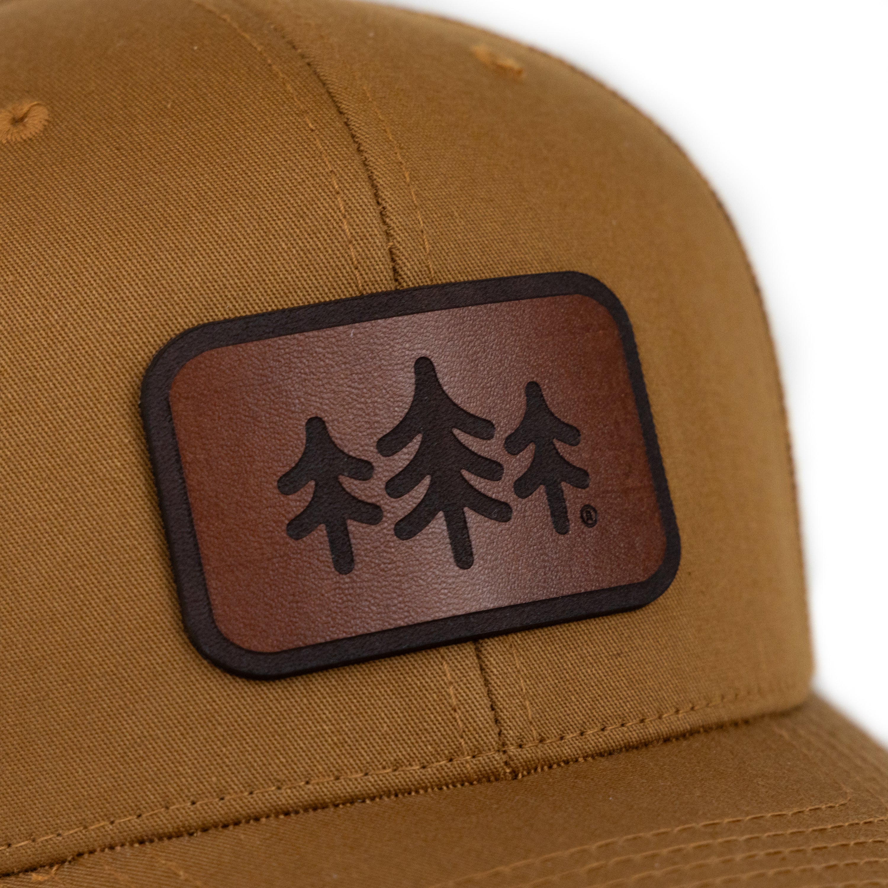 TriPine Leather Patch Trucker Hat